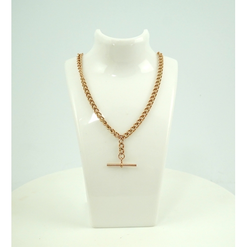 249 - A 9ct gold Albert chain, of curb linking, suspending a T-bar pendant, length 49cm, links stamped 375... 