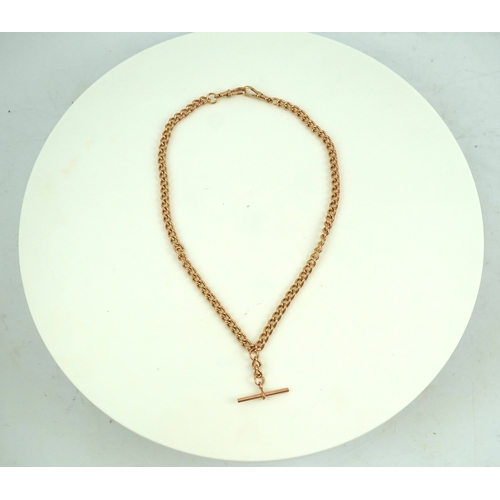 249 - A 9ct gold Albert chain, of curb linking, suspending a T-bar pendant, length 49cm, links stamped 375... 