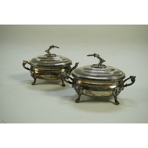 25 - A pair of George III silver two handled oval sauce tureens and covers, by Robert Garrard I, with fol... 