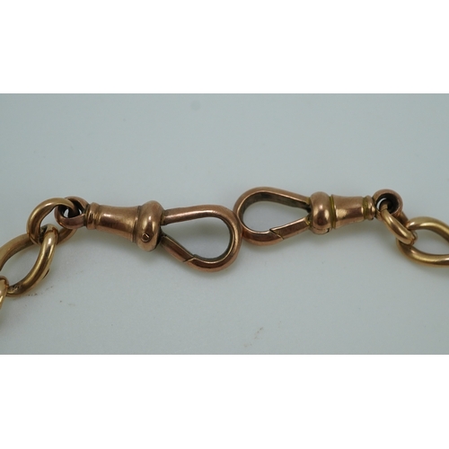 250 - An Edwardian gold Albert chain, early 20th century, of curb linking, each end with a hook clasp, len... 