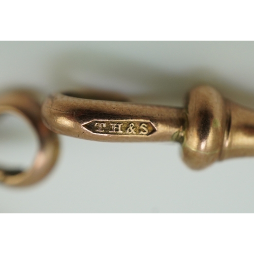 250 - An Edwardian gold Albert chain, early 20th century, of curb linking, each end with a hook clasp, len... 