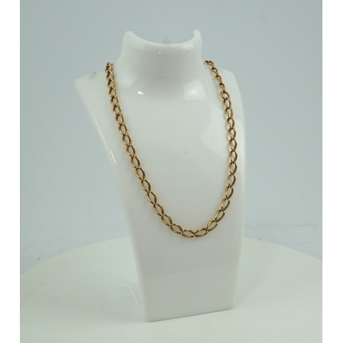 250 - An Edwardian gold Albert chain, early 20th century, of curb linking, each end with a hook clasp, len... 