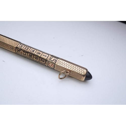 251 - A gold calendar pencil and a gold pocket stamp dispenser, comprising: a 9ct gold stamp strip dispens... 