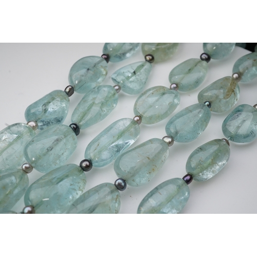 254 - Eileen Coyne, an aquamarine and cultured pearl necklace, circa 2011, composed of five strands of aqu... 