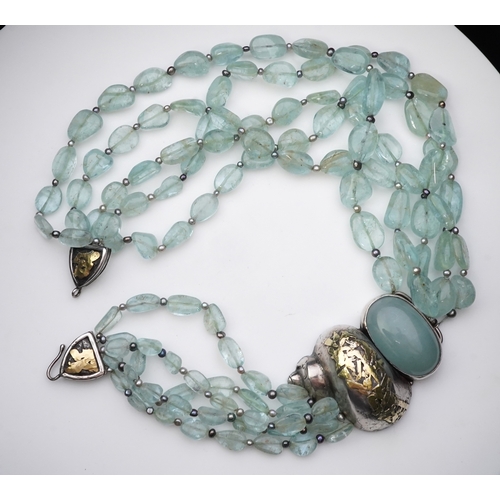 254 - Eileen Coyne, an aquamarine and cultured pearl necklace, circa 2011, composed of five strands of aqu... 