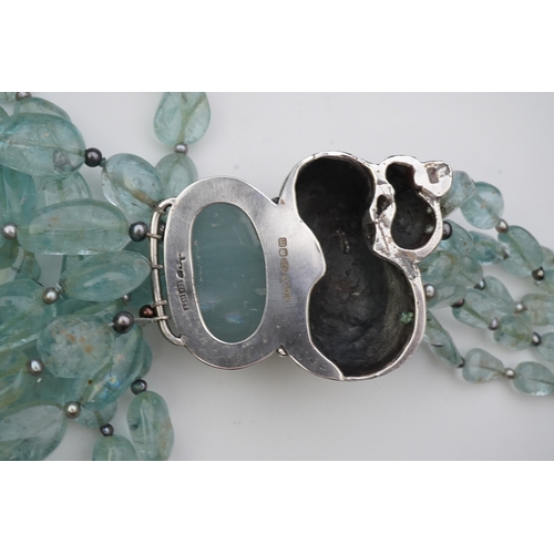 254 - Eileen Coyne, an aquamarine and cultured pearl necklace, circa 2011, composed of five strands of aqu... 