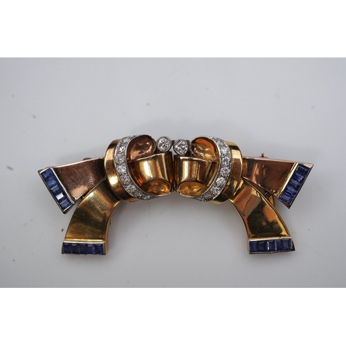 256 - A Retro gold, sapphire and diamond double clip brooch, circa 1940 each clip designed as a stylised r... 