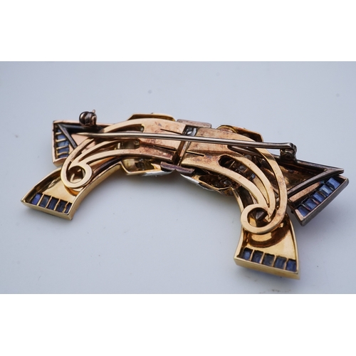 256 - A Retro gold, sapphire and diamond double clip brooch, circa 1940 each clip designed as a stylised r... 