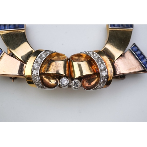 256 - A Retro gold, sapphire and diamond double clip brooch, circa 1940 each clip designed as a stylised r... 