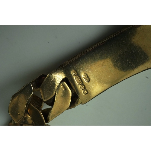 260 - A 9ct gold identity bracelet, circa 1973, composed of heavy curb linking with a textured finish, cen... 