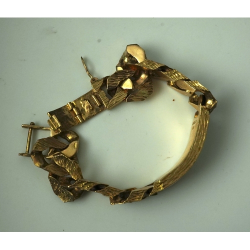 260 - A 9ct gold identity bracelet, circa 1973, composed of heavy curb linking with a textured finish, cen... 