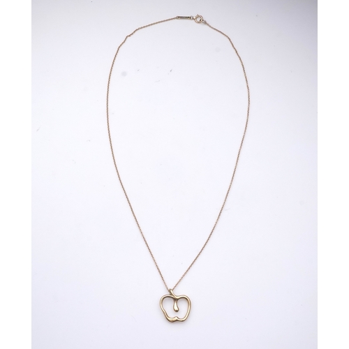 261 - Elsa Peretti for Tiffany & Co., a gold pendant, designed as a stylised apple on a fine link chain, p... 