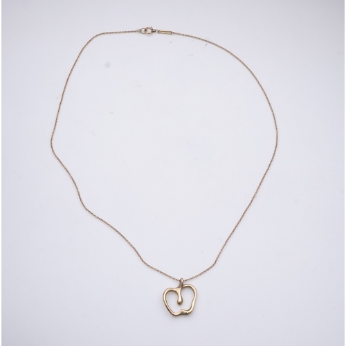 261 - Elsa Peretti for Tiffany & Co., a gold pendant, designed as a stylised apple on a fine link chain, p... 