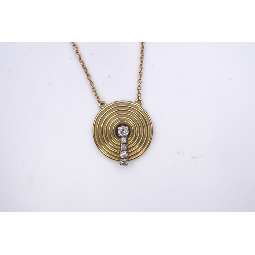 265 - An 18ct gold and diamond pendant, circa 1978, designed as a grooved disc set with a line of graduate... 