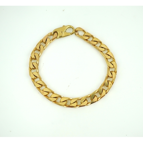 266 - A 9ct gold bracelet, circa 1989, of curb linking, length 21cm, British hallmarks, gross weight 38 gr... 