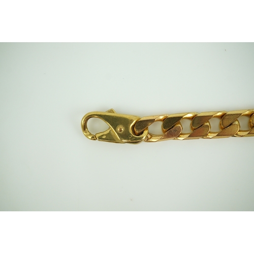 266 - A 9ct gold bracelet, circa 1989, of curb linking, length 21cm, British hallmarks, gross weight 38 gr... 