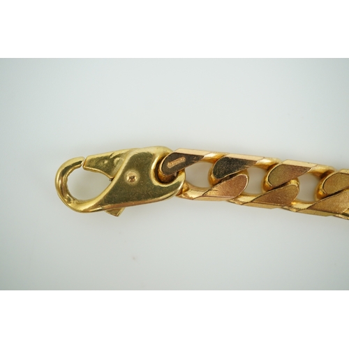 266 - A 9ct gold bracelet, circa 1989, of curb linking, length 21cm, British hallmarks, gross weight 38 gr... 