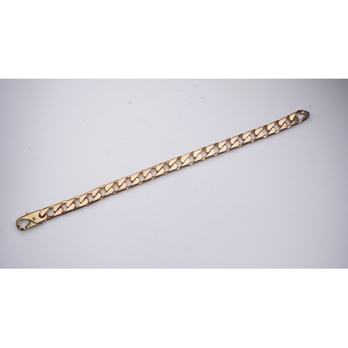 266 - A 9ct gold bracelet, circa 1989, of curb linking, length 21cm, British hallmarks, gross weight 38 gr... 