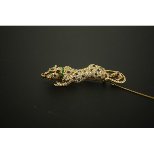 267 - A sapphire, emerald and diamond brooch, designed as a stalking leopard, set with brilliant-cut diamo... 