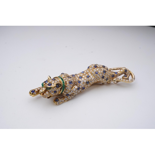 267 - A sapphire, emerald and diamond brooch, designed as a stalking leopard, set with brilliant-cut diamo... 