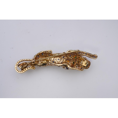 267 - A sapphire, emerald and diamond brooch, designed as a stalking leopard, set with brilliant-cut diamo... 