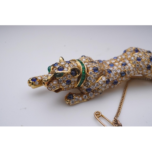 267 - A sapphire, emerald and diamond brooch, designed as a stalking leopard, set with brilliant-cut diamo... 