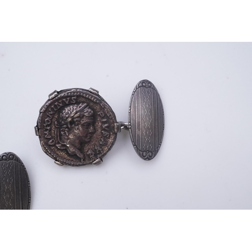 270 - A pair of coin cufflinks, each set with a coin, depicting the emperors Antoninus Pius (r.138-161) an... 