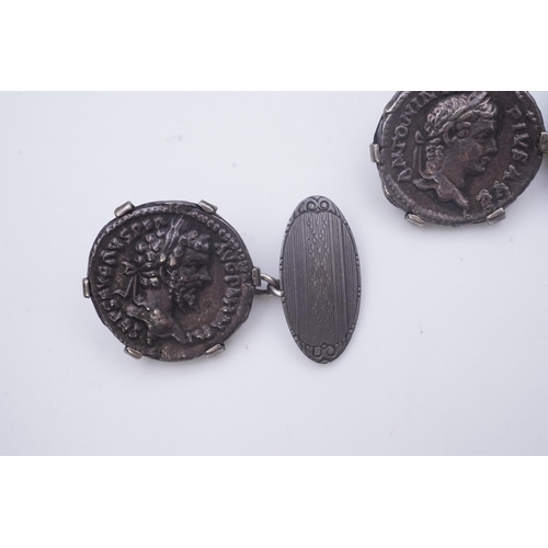 270 - A pair of coin cufflinks, each set with a coin, depicting the emperors Antoninus Pius (r.138-161) an... 