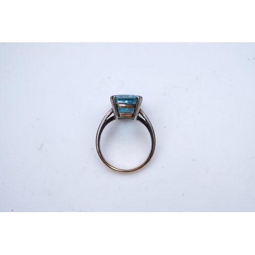 274 - An aquamarine ring, mid 20th century, claw-set with a mixed step-cut aquamarine measuring approximat... 