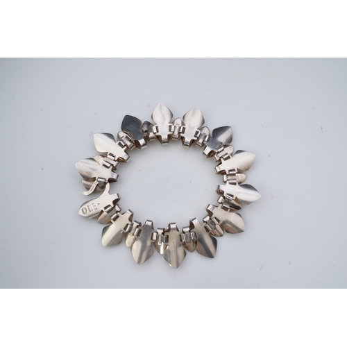 276 - Tuk Fisher for Georg Jensen, a silver bracelet, Denmark, circa 1977, composed of layered links of st... 