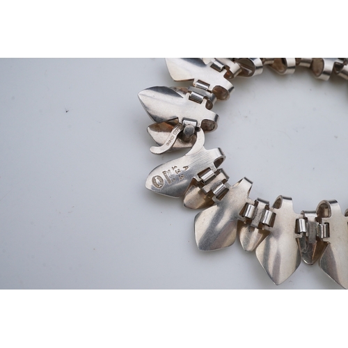 276 - Tuk Fisher for Georg Jensen, a silver bracelet, Denmark, circa 1977, composed of layered links of st... 