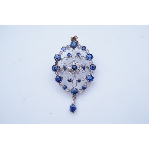 290 - A sapphire and diamond brooch/pendant, mid 20th century, of Edwardian inspiration, composed of a cir... 