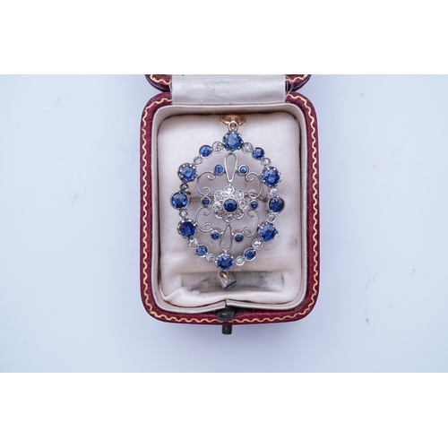 290 - A sapphire and diamond brooch/pendant, mid 20th century, of Edwardian inspiration, composed of a cir... 