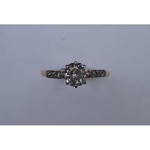 293 - A diamond ring, early 20th century, claw-set with a cushion-shaped diamond weighing approximately 0.... 