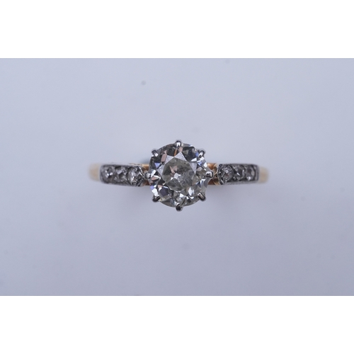 293 - A diamond ring, early 20th century, claw-set with a cushion-shaped diamond weighing approximately 0.... 