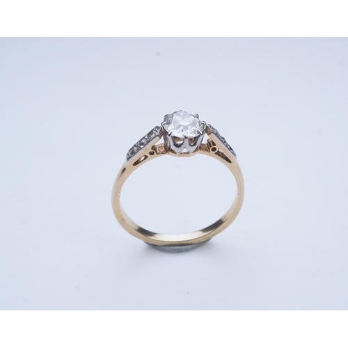 293 - A diamond ring, early 20th century, claw-set with a cushion-shaped diamond weighing approximately 0.... 