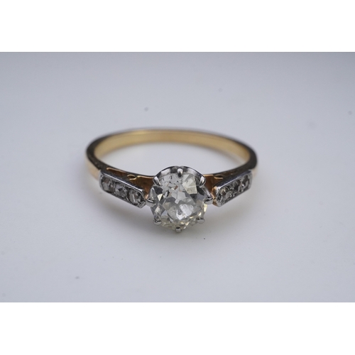 293 - A diamond ring, early 20th century, claw-set with a cushion-shaped diamond weighing approximately 0.... 