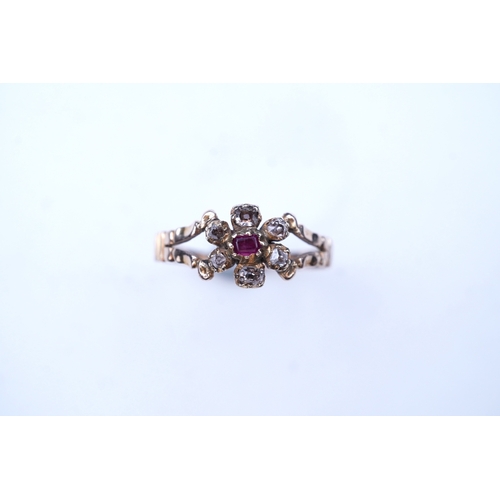 298 - A Georgian ruby and diamond ring, early 19th century, of cluster design, set with cushion-shaped rub... 