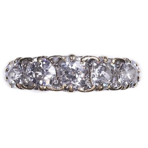 302 - An 18ct gold and diamond five-stone ring, early 20th century, set with a sequence of graduated circu... 