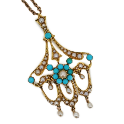 310 - An Edwardian turquoise and seed pearl pendant, early 20th century, of foliate scroll design suspendi... 