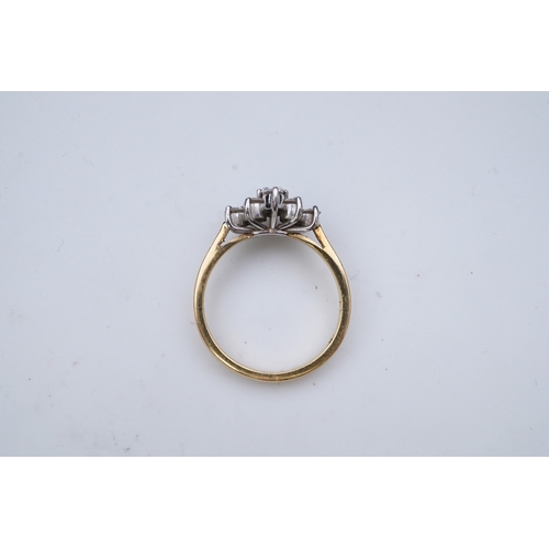 316 - A diamond ring, designed as an elongated cluster of brilliant-cut diamonds, mounted in 18ct gold, si... 