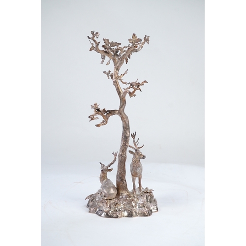 32 - A mid Victorian silver plated centrepiece, by Elkington & Co, modelled as two stags beneath a tree o... 