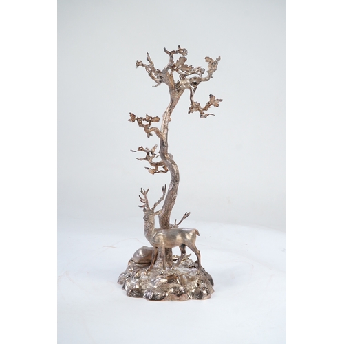 32 - A mid Victorian silver plated centrepiece, by Elkington & Co, modelled as two stags beneath a tree o... 