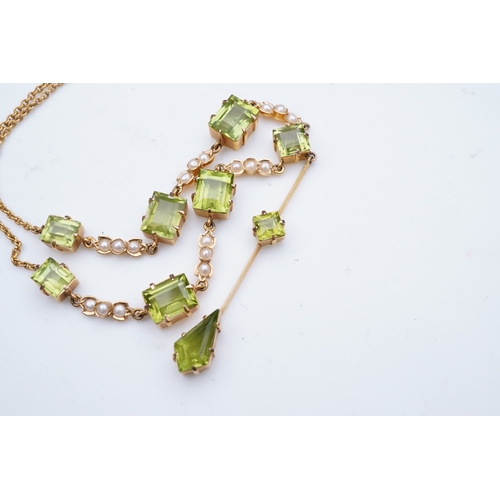 320 - An Edwardian peridot and seed pearl necklace, early 20th century the front composed of links claw-se... 