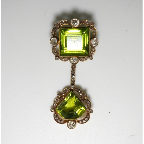 321 - A peridot and diamond brooch, circa 1900 Composed of a step-cut peridot within a foliate border of c... 