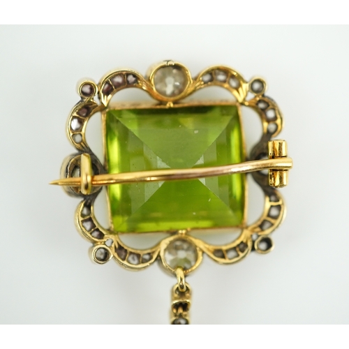 321 - A peridot and diamond brooch, circa 1900 Composed of a step-cut peridot within a foliate border of c... 