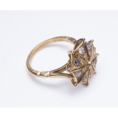 323 - A sapphire and diamond ring, modelled as an open parasol, set with circular-cut sapphires and brilli... 