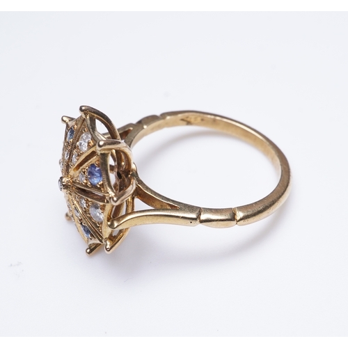 323 - A sapphire and diamond ring, modelled as an open parasol, set with circular-cut sapphires and brilli... 