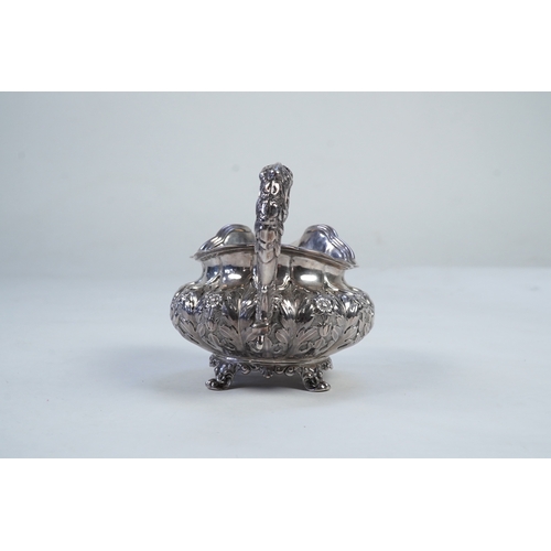 33 - A William IV Irish silver cream jug, by James Le Bas, of squat melon form, with foliate decoration, ... 