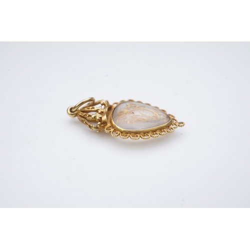 332 - An unusual gold pendant, late 18th/early 19th century, designed as a heart-shaped glazed compartment... 